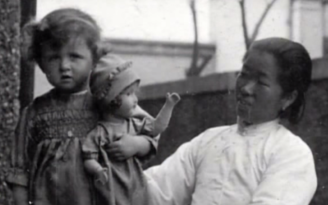 Jennifer Paterson as a child, with her Chinese amah.